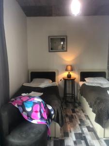 Postel nebo postele na pokoji v ubytování Verona Apartment