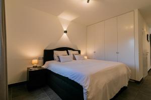 Postel nebo postele na pokoji v ubytování B&B Villa Curtricias