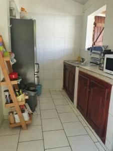 a kitchen with a sink and a counter top at Hameau de Soissons in Billy-sur-Aisne +1 photo