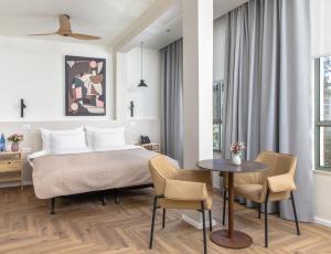 Hotel Carmel  객실 침대