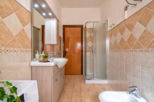 Koupelna v ubytování Family Beach apartment