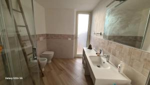 Koupelna v ubytování Mirto's House - La Maddalena