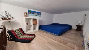 Postel nebo postele na pokoji v ubytování Mirto's House - La Maddalena