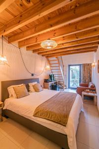 Postel nebo postele na pokoji v ubytování B&B Villa Curtricias