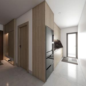 a kitchen with wooden cabinets and a refrigerator at Khai Sơn Apartment 2Bedrooms in Hanoi +6 photos