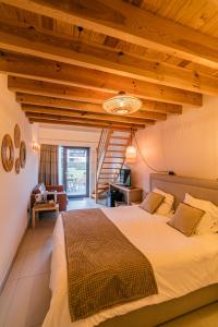 Postel nebo postele na pokoji v ubytování B&B Villa Curtricias + 37 fotografií