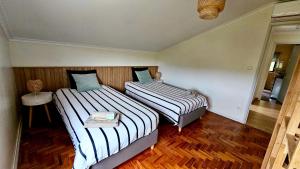 Ένα ή περισσότερα κρεβάτια σε δωμάτιο στο Riverside Nature Apartment