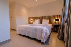 Postel nebo postele na pokoji v ubytování B&B Villa Curtricias