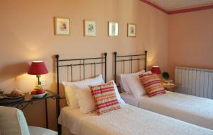 Uma cama ou camas num quarto em Albergo La Fontanella