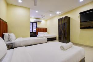 Postel nebo postele na pokoji v ubytování Hotel deluxe