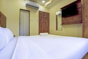 Postel nebo postele na pokoji v ubytování Hotel deluxe