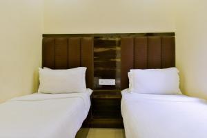 Postel nebo postele na pokoji v ubytování Hotel deluxe