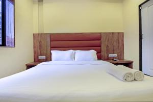 Postel nebo postele na pokoji v ubytování Hotel deluxe