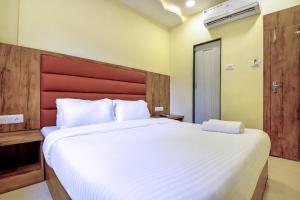 Postel nebo postele na pokoji v ubytování Hotel deluxe