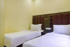 Postel nebo postele na pokoji v ubytování Hotel deluxe