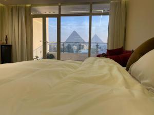 Cama o camas de una habitación en Roone pyramids view inn