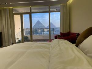 Cama o camas de una habitación en Roone pyramids view inn