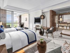 Uma TV ou centro de entretenimento em Sofitel Bali Nusa Dua Beach Resort