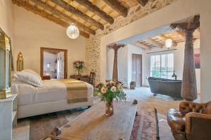 Postel nebo postele na pokoji v ubytování Alcazar Del Garraf