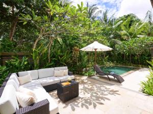 Um jardim em Sofitel Bali Nusa Dua Beach Resort