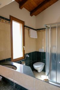 Koupelna v ubytování Hotel Il Castagno