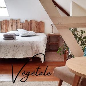 Postel nebo postele na pokoji v ubytování Bains de Secours, Chambres d'hotes
