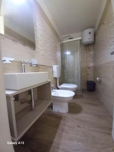 Koupelna v ubytování TORRE SUL MARE affittacamere Ugento + 37 fotografií