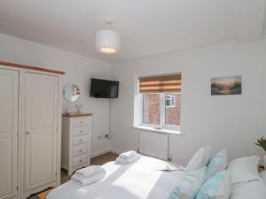 En eller flere senge i et værelse på Weydale Avenue