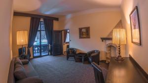 Predel za sedenje v nastanitvi Hotel Lovecký zámeček Orion