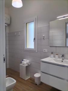 Koupelna v ubytování Lugore Room