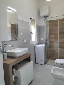 Koupelna v ubytování Lugore Room