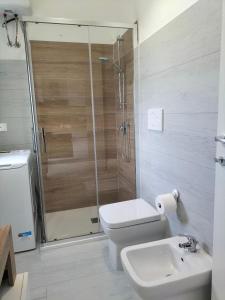 Koupelna v ubytování Lugore Room
