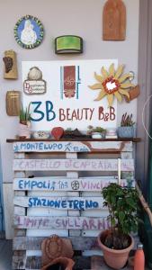 a sign for a beauty bar on a wall at 3B Firenze in Capraia e Limite