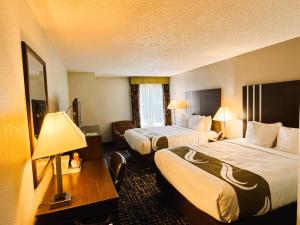 Ένα ή περισσότερα κρεβάτια σε δωμάτιο στο Quality Inn Cleveland North +33 φωτογραφίες