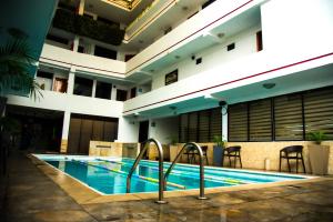 Bazén v ubytování Hotel la Giralda nebo v jeho okolí