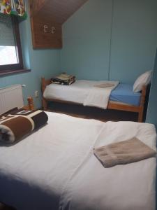 Postel nebo postele na pokoji v ubytování Apartmani Elko + 3 fotografie