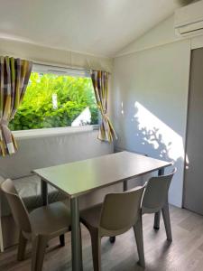 Foto dalla galleria di Camping 2 étoiles - ccbabhg a Angicourt Altre 37 foto