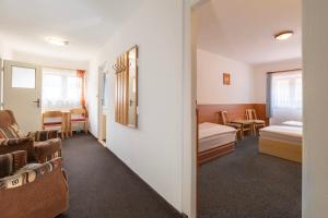 Ένα ή περισσότερα κρεβάτια σε δωμάτιο στο Sport Hotel Gejzirpark
