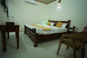 Postel nebo postele na pokoji v ubytování Shree Shyam Chaupati & Resort + 11 fotografií