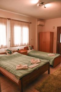 Postel nebo postele na pokoji v ubytování Cactus rooms + 34 fotografií