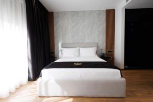 Postel nebo postele na pokoji v ubytování Destiny Hotel & SPA