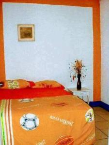 Postel nebo postele na pokoji v ubytování Apartamentos Los Ángeles , Managua , Nic