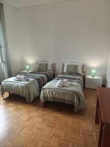 Postel nebo postele na pokoji v ubytování ROSI HOME