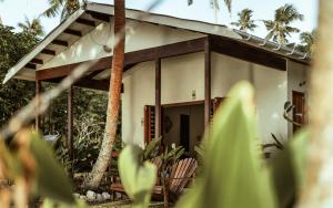 Zahrada ubytování Whispering Palms - Absolute Beachfront Villas