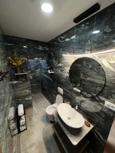 Ένα μπάνιο στο Prenoćište-Sobe-Rooms-Aman