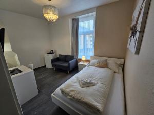 Voodi või voodid majutusasutuse Hotel Surselva toas
