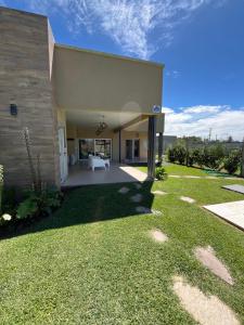 a view of a house with a yard at Casa Quinta in Chivilcoy