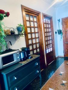 Kuchyň nebo kuchyňský kout v ubytování Porto Di Colombo - Affittacamere vicino spiaggia e città