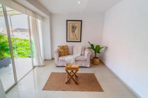 Posezení v ubytování Suite House Juanambu