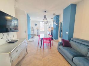 a living room with a couch and a table at Luxury 3 bed 2 bath flat Cannes Croisette in Cannes